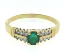 Fantastic Oval Cut Emerald & 2 Row Diamond Side Ring