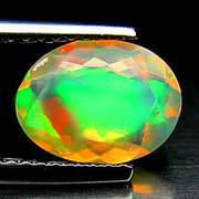 Electric! 1.23ct full body flashing untreated Opal