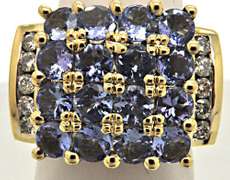 14K YELLOW GOLD TANZANITE AND DIAMOND RING.