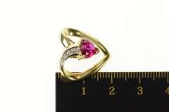 10K Yellow Gold Heart Syn. Ruby Diamond Accent Curvy Pendant