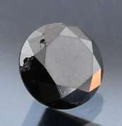Very fine .93ct smooth cut Black Diamond solitaire