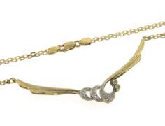 Powerful Yellow Gold Diamond Accent Bib Swirl Necklace