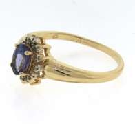 Amazing Yellow Gold Oval Tanzanite and Diamond Halo Ring