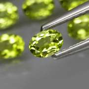 Real 6.75ct untreated apple green Peridot set