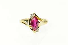 10K Yellow Gold Diamond Accent Marquise Syn. Ruby Bypass Ring