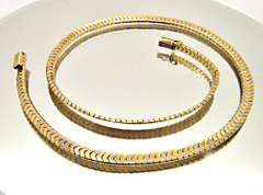14KT TRI COLOR LADIES OMEGA NECKLACE.