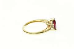 10K Yellow Gold Pear Syn. Garnet CZ Accent Three Stone Ring