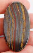 Dramatic 83.96ct Tiger Eye cabochon