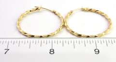 Youthful Twisted Hoops in 14KT Yellow Gold