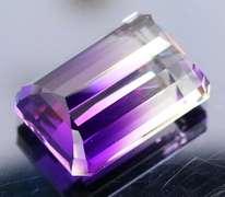 Beautiful 24.87ct top color created Ametrine