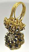 LADIES 18 KT DIAMOND AND SAPPHIRES PYRAMIDE RING.