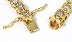 Stunning 7.01CTW Diamond Tennis Bracelet in 14KT Yellow Gold