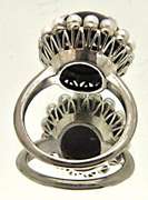 LADIES 14K WHITE GOLD RED STAR RUBY AND PEARL RING.