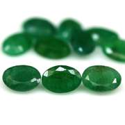 Oval cut 6.02ct Zambian Emerald set