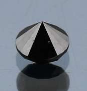 Very fine .54ct smooth cut Black Diamond solitaire