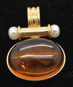 STUNNING AMBER SET IN 14KT YELLOW GOLD