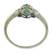 Charming Oval Emerald and Diamond Halo Ring