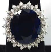 Mystifying Blue Sapphire & Diamond Halo Ring in 14KT White Gold