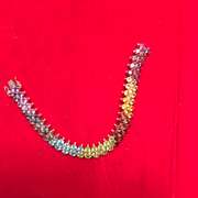 Ladies 14k gold bracelet with multi color gem stones