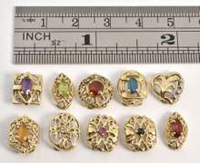 Useful Group of 10 Filigree Sliders