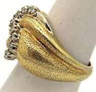 14K YELLOW GOLD DIAMOND RING.