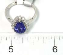 Shimmering 2.31CT Tanzanite & Diamond Ring in 18KT White Gold