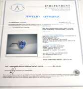 Shimmering 2.31CT Tanzanite & Diamond Ring in 18KT White Gold