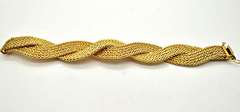 14 CARAT YELLOW GOLD 5 ROW TWISTED POPCORN BRACELET.