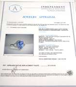 Entrancing 4.62CT Tanzanite & Diamond Ring in 18KT White Gold