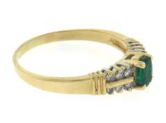 Fantastic Oval Cut Emerald & 2 Row Diamond Side Ring