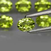 Real 6.62ct untreated apple green Peridot set