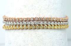 Incredible 5.56CTW Diamond 3-Strand Bracelet in 3-Tone 18KT Gold