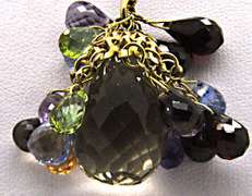 18KT YELLOW GOLD MIXED GEMSTONE BRIOLETTE NECKLACE.
