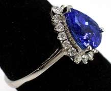Shimmering 2.31CT Tanzanite & Diamond Ring in 18KT White Gold