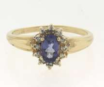 Amazing Yellow Gold Oval Tanzanite and Diamond Halo Ring