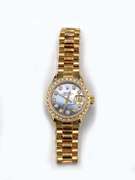 Ladies Diamond Datejust Rolex in 18KT Gold