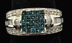 LADIES BLUE & WHITE DIAMOND RING.