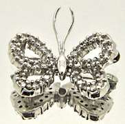 14 KT WHITE GOLD & DIAMOND BUTTERFLY BROOCH.
