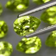 Pear cut! Unheated! 6.91ct Peridot set!
