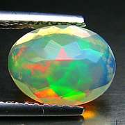 Electric! 1.23ct full body flashing untreated Opal