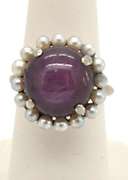 LADIES 14K WHITE GOLD RED STAR RUBY AND PEARL RING.