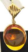 STUNNING AMBER SET IN 14KT YELLOW GOLD