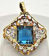14 KT YELLOW GOLD BLUE TOPAZ AND DIAMOND PENDANT