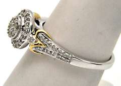 14KT WHITE GOLD DIAMOND RING WITH YELLOW GOLD ACCENTS.