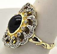 LADIES 14 KT TWO TONE DIAMOND AND SAPPHIRE RING.
