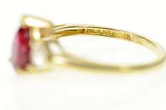 10K Yellow Gold Pear Syn. Garnet CZ Accent Three Stone Ring
