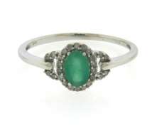 Charming Oval Emerald and Diamond Halo Ring