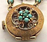 14 KT GENEVA WATCH PIN WITH TURQUOISE ACCENTS