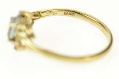 10K Yellow Gold Oval Blue Topaz Diamond Bypass Ring