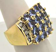 14K YELLOW GOLD TANZANITE AND DIAMOND RING.